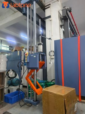 Testeur de chute professionnel en laboratoire pour surfaces, test de chute sur coins et bords selon les normes industrielles